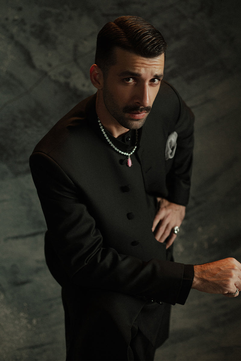 Classic black sherwani for grooms with stylish patterns